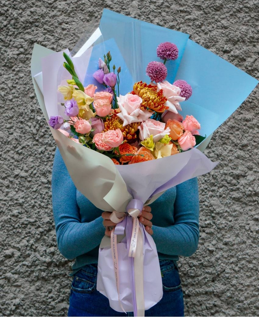 Bouquet in pastel colors with seasonal flowers